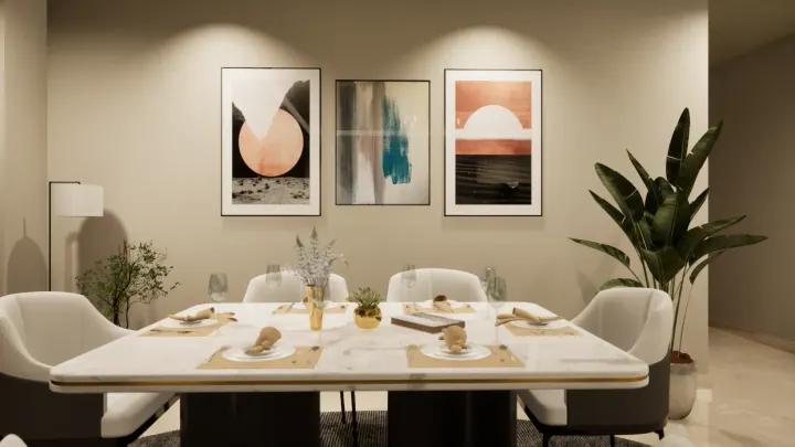 Dining room with three framed prints above a white marble table