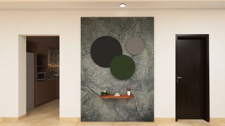 Foyer with a textured green art panel and a floating shelf