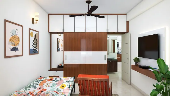 Guest bedroom design showing the wardrobe wall and attached bathroom access