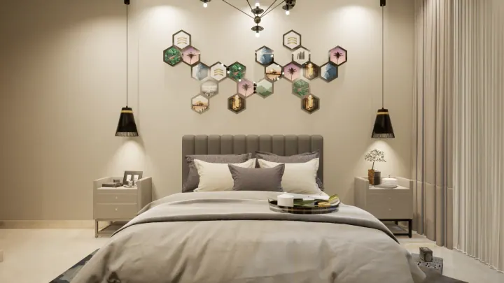 Beige bedroom with hexagonal wall decor, pendant lights and a channel-tufted headboard