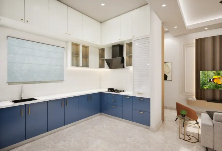 White and navy L-shaped modular kitchen with a chimney and glass-front uppers