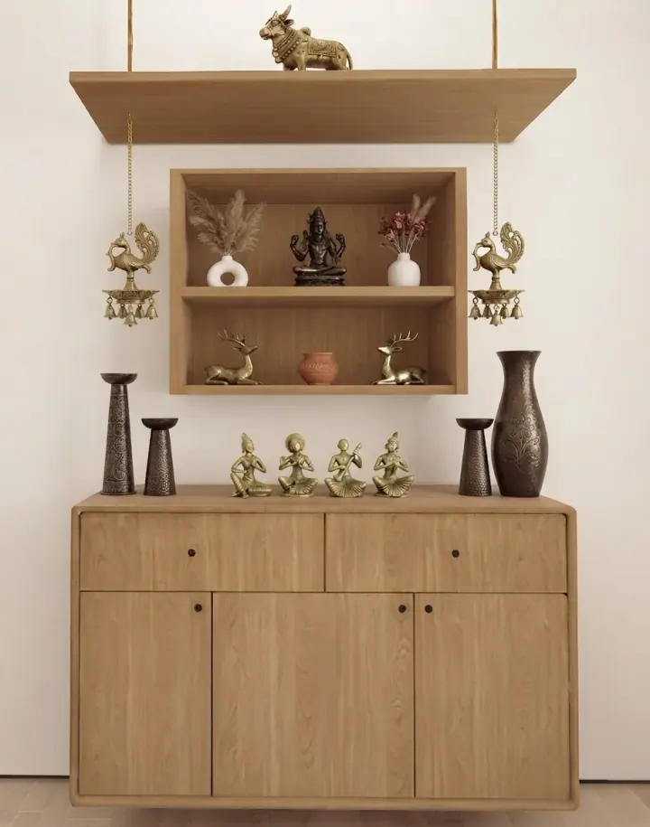 Oak pooja unit with an open shelf and carved peacock brackets