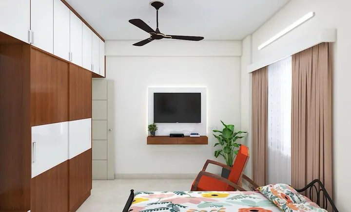 Bedroom wardrobe wall design with loft units and a matching TV console